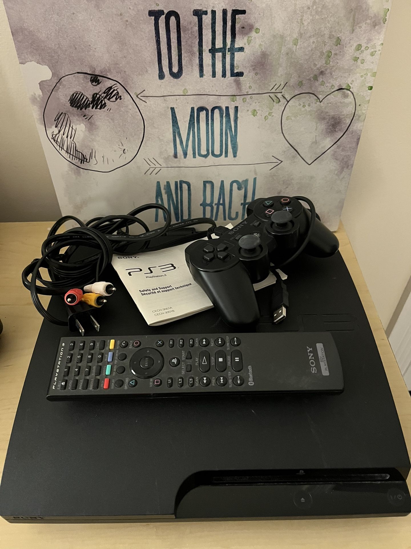 Playstation 3 Slim Console - PS3 with Remote, Controller,  Charger, Cables And Booklet