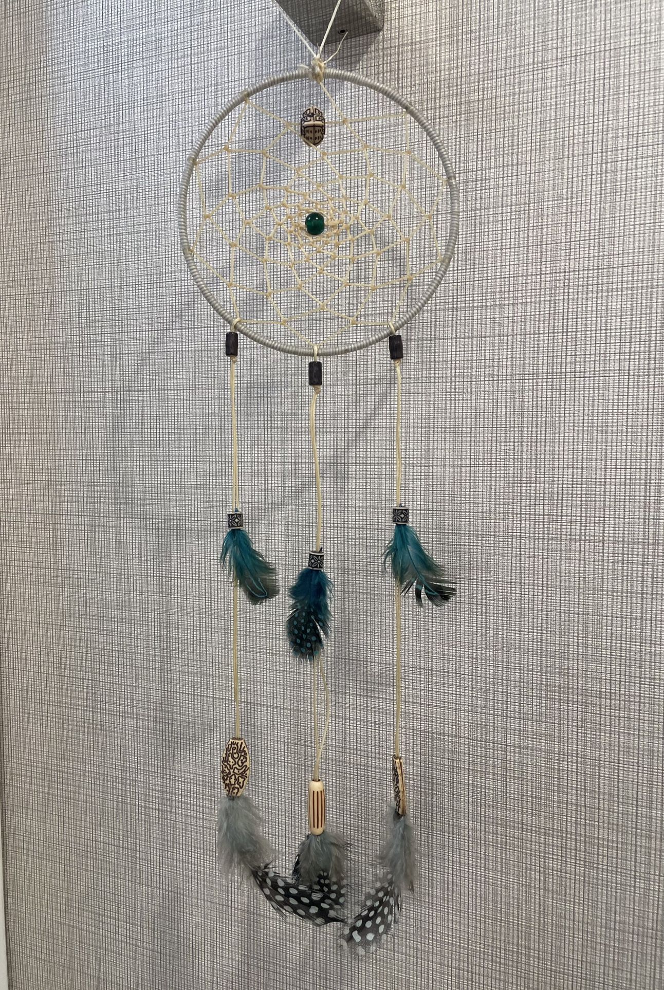 Beautiful Handcrafted dreamcatcher with feathers and beads