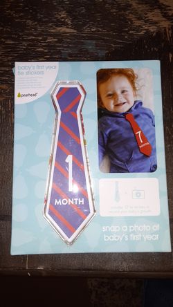 Babies first year, tie stickers. I also added the other stickers to the box as I had them from the set's I had for my baby's first moment's.