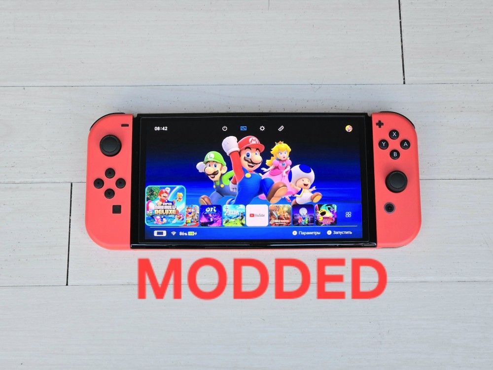 NINTENDO SWITCH OLED MOD 300 GAMES + 25000 RETROS 