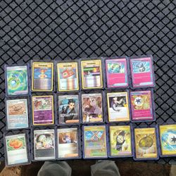 Trainer Pokémon cards some gold Pokémon cards some NBA Stamp some pink Cards selling By Lot $444 all or best offer $30! Each