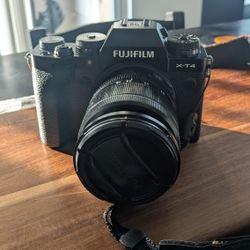 Fuji x-t4 with XF 18-55mm f/2.8-4 (plus batteries and charger)