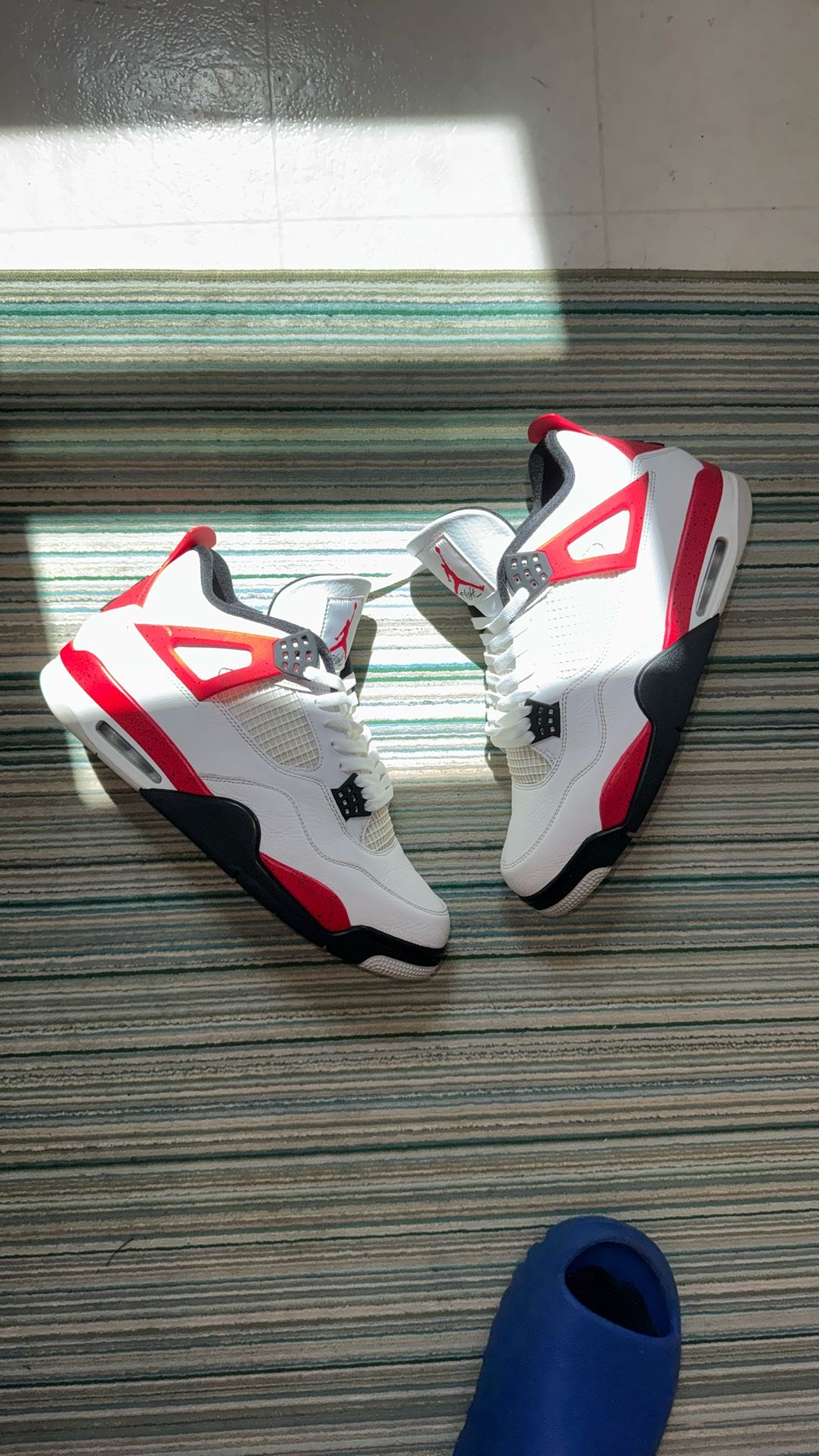Jordan 4 “Red Cement”