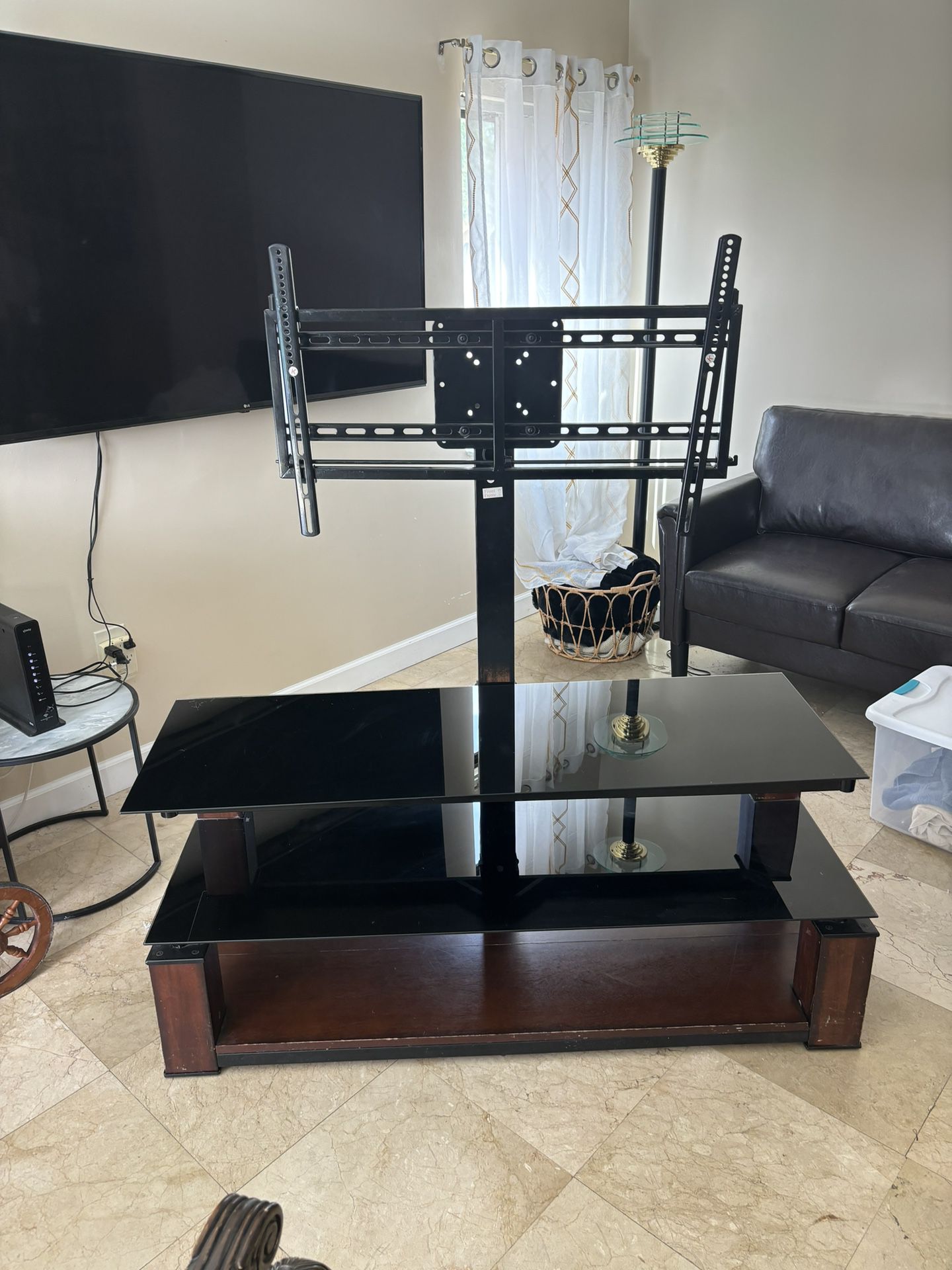 TV console with stand to the TV