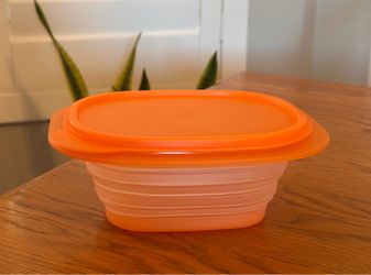 $8….New Tupperware 850ml flatout container.  850 ml is equal to approximately 3.6 US Customary cups. Pickup in the area of 36th Ave and Pinnacle peak 