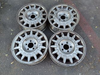 Mercury sable 15x6 inch aluminum wheels. 5 on 108mm fits ford etc