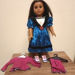 American Girl Doll With Clothes, Shoes, and Two Hanegers.  