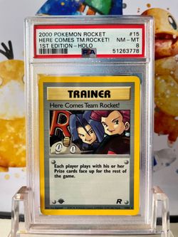 PSA 8 1st Edition Holo Here Comes Team Rocket