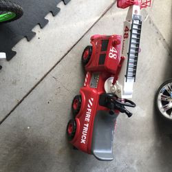 Fire Truck Squirts Water With Sirens Blasting