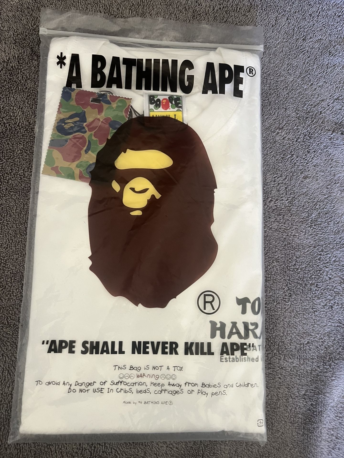 One Sided Nonchalant White Bape T