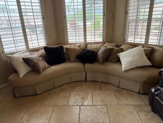 Curved cream sectional