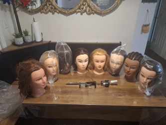8 cosmetology heads and stand