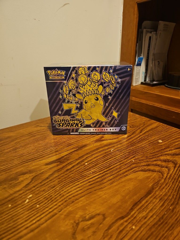 Surging Sparks ETB Sealed/New