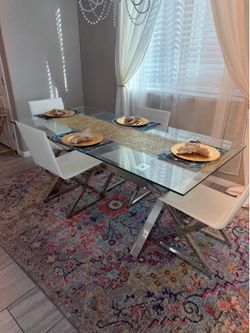 Glass top dining table and 4 chair