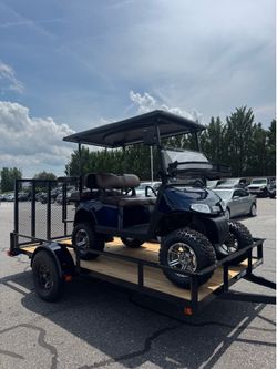 Golf cart and trailer
