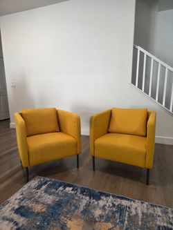 2 Ikea Ekero Armchairs Yellow