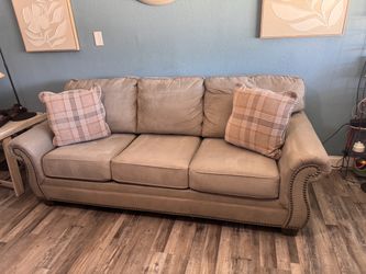 Beige 3-Seat Sofa with Nailhead Trim small scuff on one year old clean