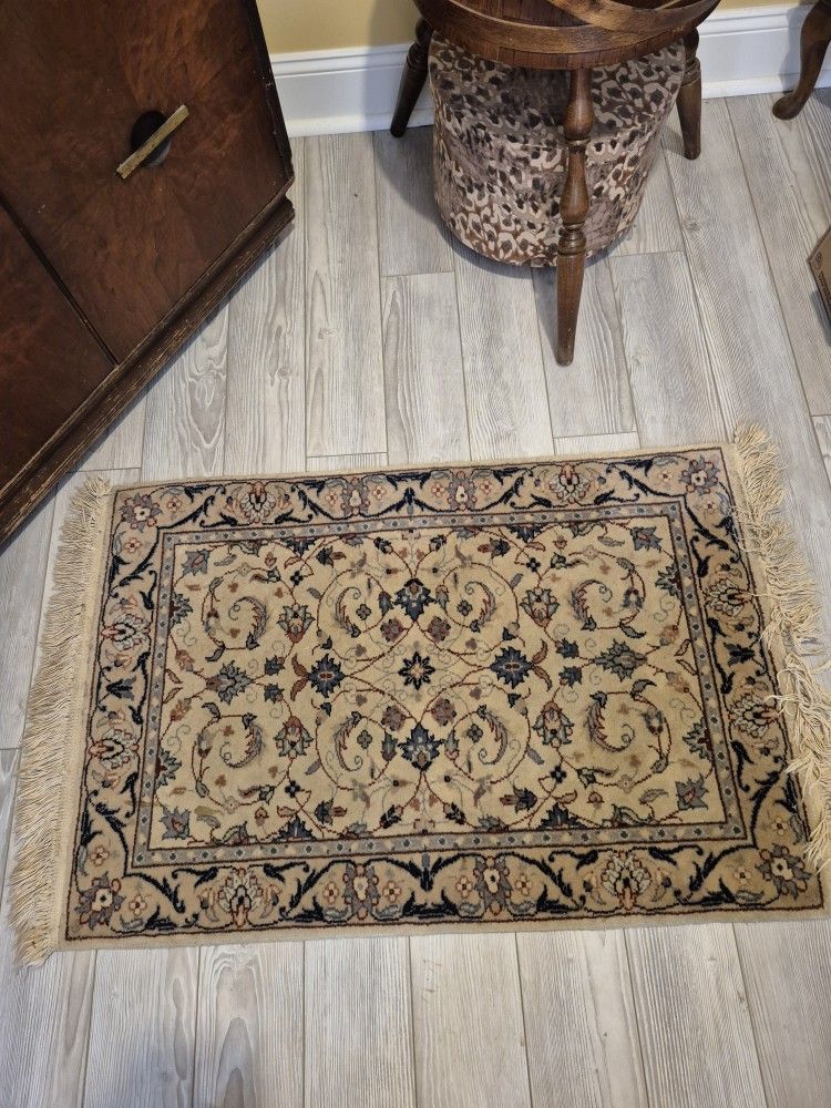 Hand knotted medallion wool small rug