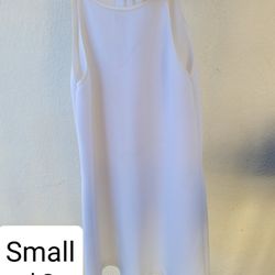 White dress. Sleeveless dress. Vestido blanco