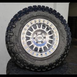 18" Kmc rims w/ 34" Nitto Trail Grappler tires