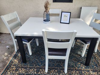 Black and sage green dining table