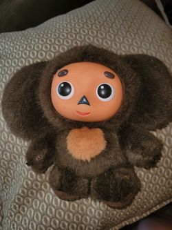 Cheburashka Russian plush toy featuring a soft plush body with a solid rubber face.