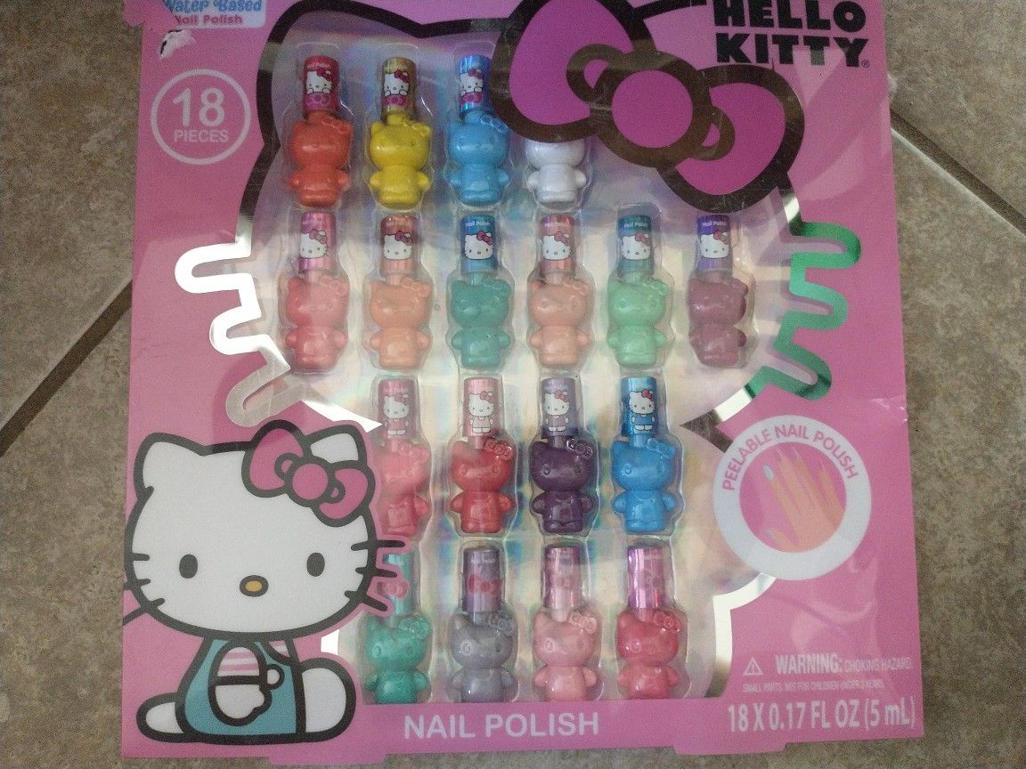 Hello Kitty 18 piece nail. Polish set multiple colors & peelable