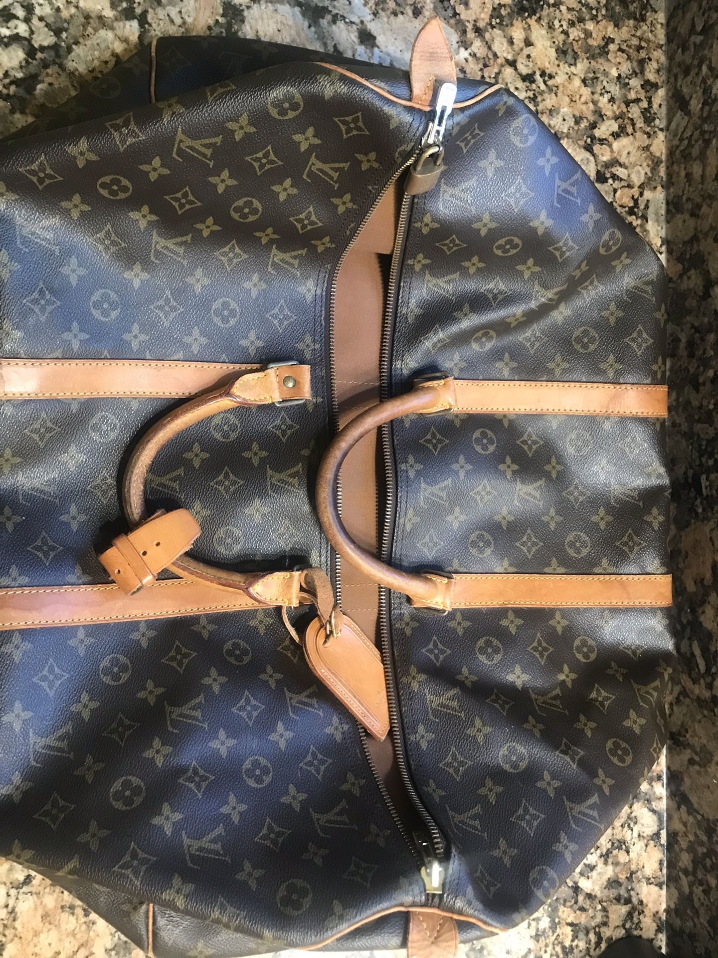 Vintage Louis Vuitton duffle bag 60cm in great - Depop