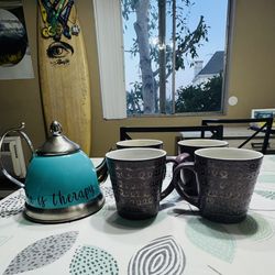 Tea Set + 4 Mugs. $10