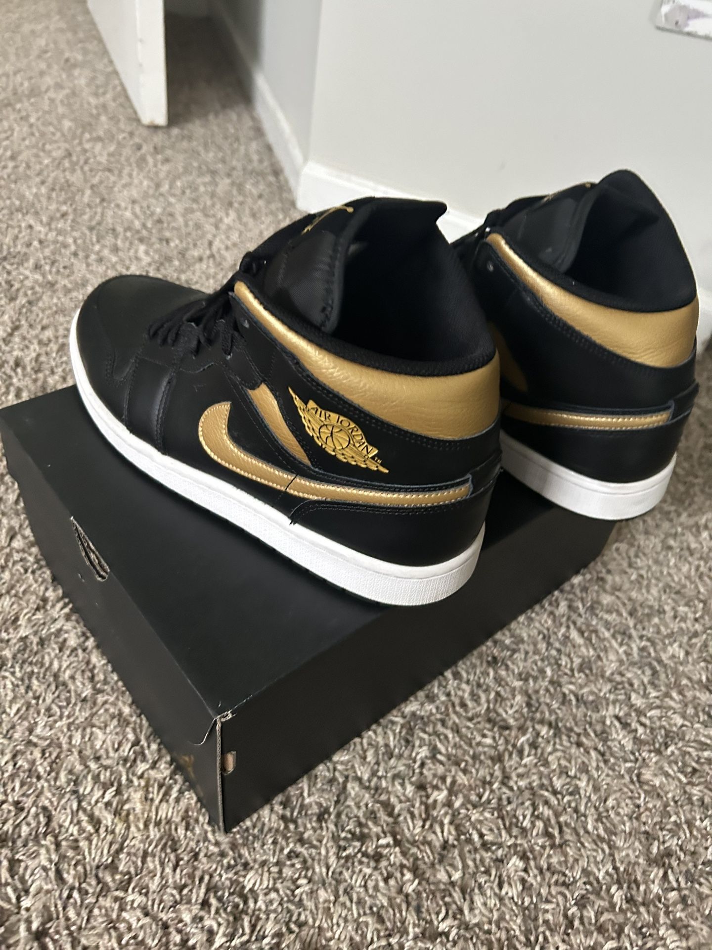 Black And Gold Jordan 1s