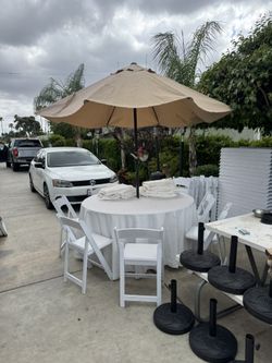 garden table and recina chairs