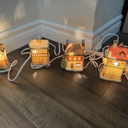 4 Vintage Lighted porcelain Houses