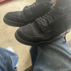 black cats jordan 4s