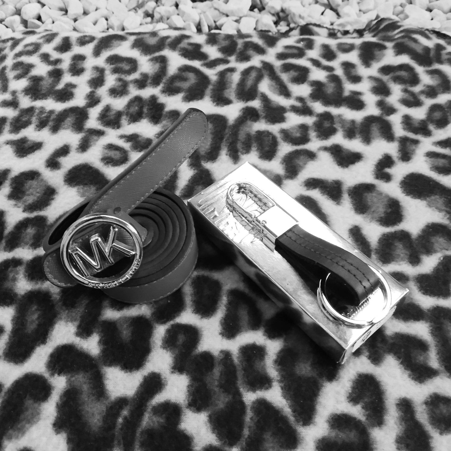 Women Mk belt and Rivera key ring.