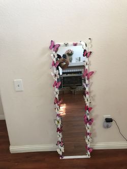 Pink and white butterflies mirror