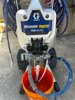 Magnum Graco ProX19 paint sprayer w/ cart.