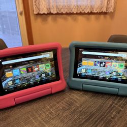 Amazon Fire 7 Tablet Bundle. Includes (2) Tablets With Additional 64GB Memory Cards For Each