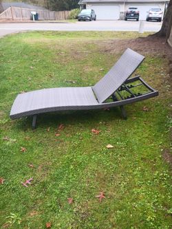 lawn chair size 6.1/2 ins long by 2 feet 1" wide and it adjustable and folds up with wheels in back to roll it around like brand new still