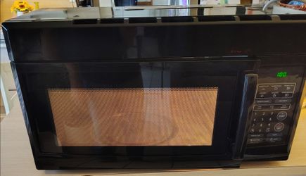 MAGIC CHEF 1.6 CU FT OVER THE RANGE MICROWAVE DELIVERY AVAILABLE