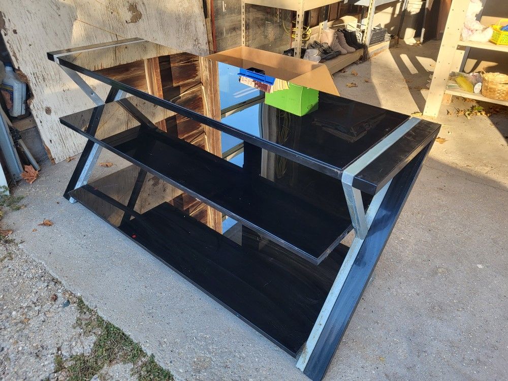 Tempered Glass 3 shelf TV Stand. Approx 15x50x23"