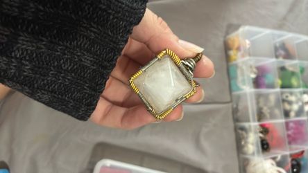Hand wrapped polished quartz pyramid pendant