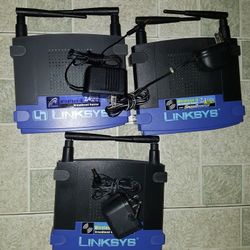 2 Linksys Wireless-g 2.4 GHz Broadband Router