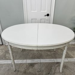 Stirdy wood oval dining table selling as is