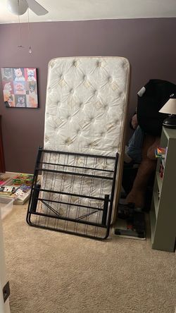Cushioned Twin sized Mattress with Bed Frame