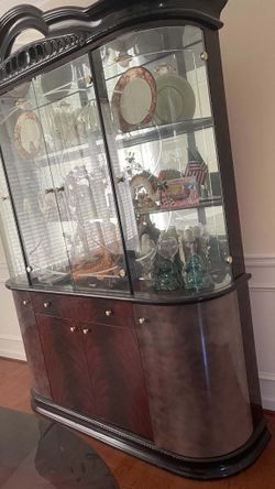 Large Traditional Bow-Front Curio Cabinet with Glass Doors and Storage Base.