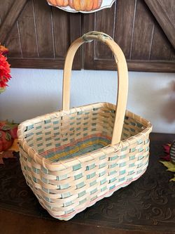 rectangular woven splint basket featuring natural wood sides