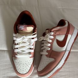 pink and red dunks 
