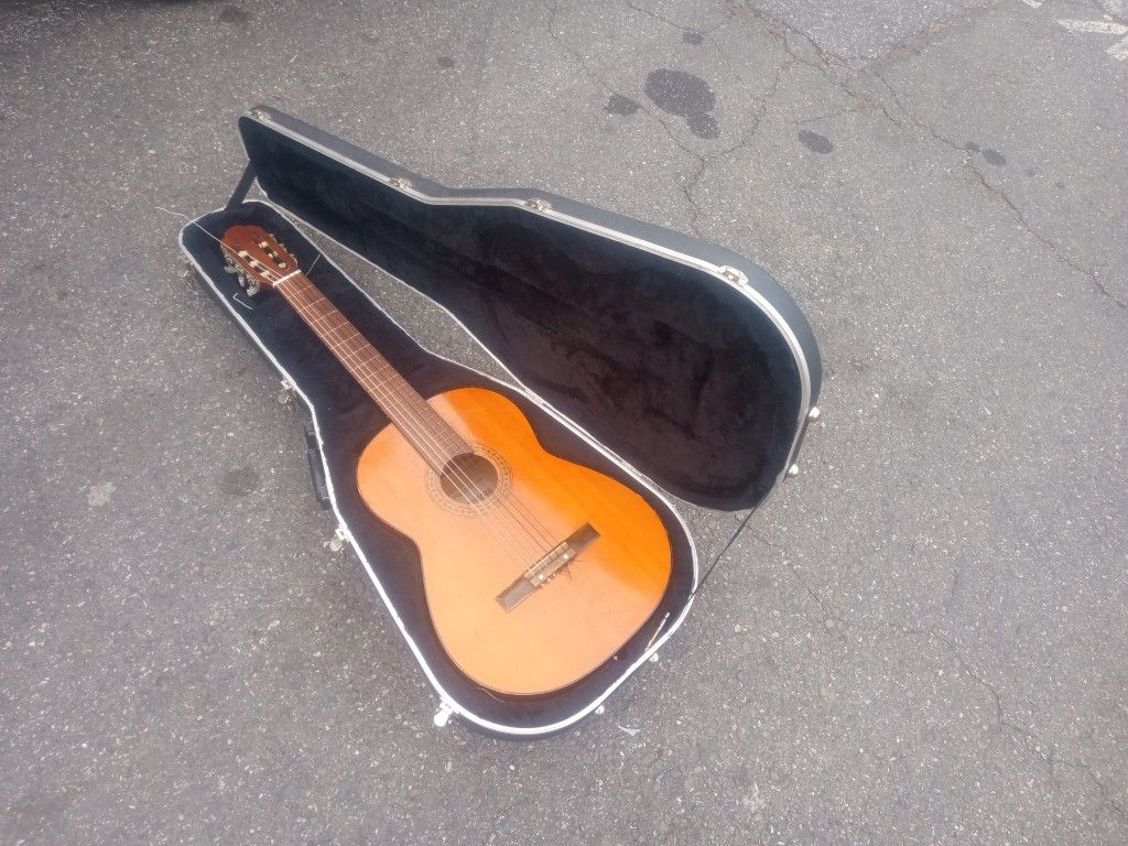 Franciscan Nylon String Guitar With A Ramirez Hard Shell Case