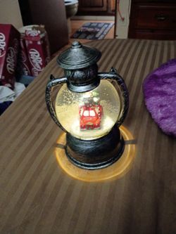 A lantern snow globe