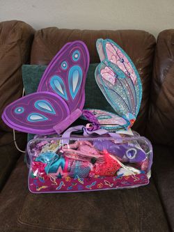Bag of dress up fun  shoes, wings, costumes, crowns
